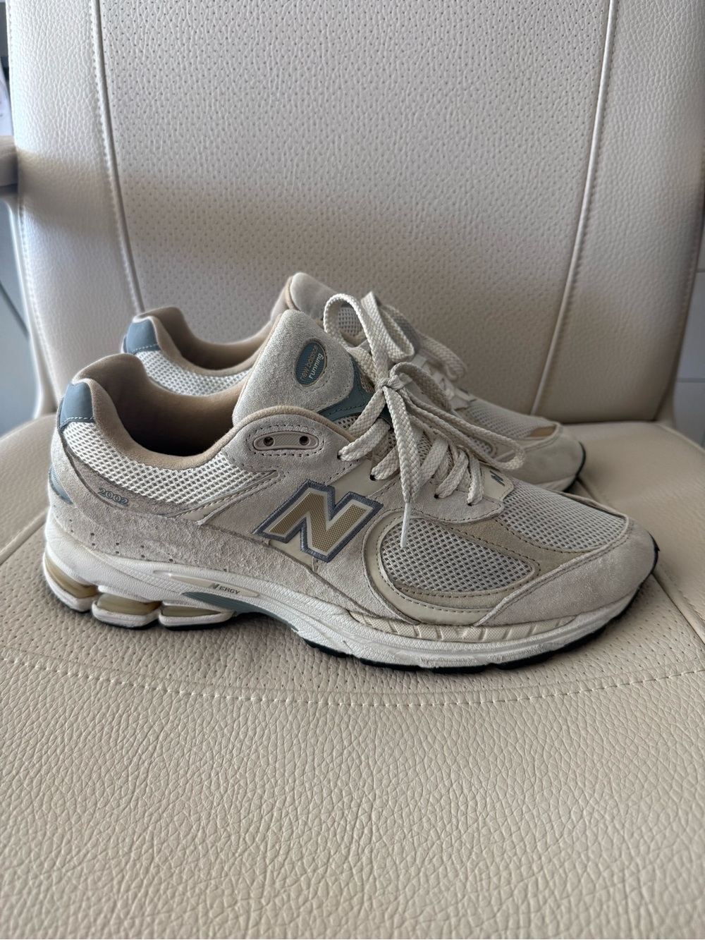 Size 9.5 - New Balance 2002R Beige and Light Blue Neutral-Accented Sneakers
